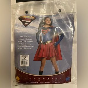 NEW in package Super Girl costume, size small (4-6)